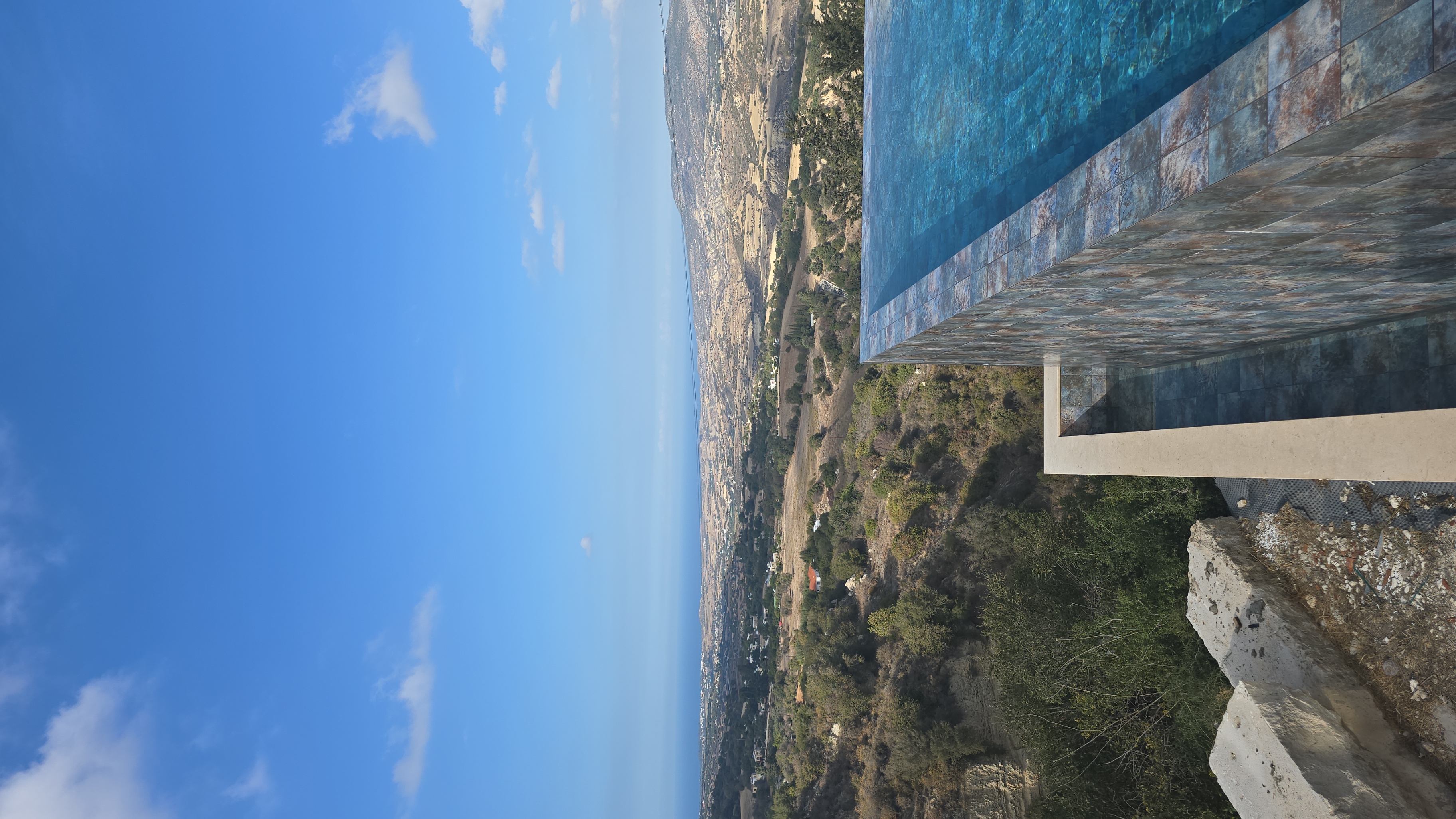 infinity pool sea view sunset